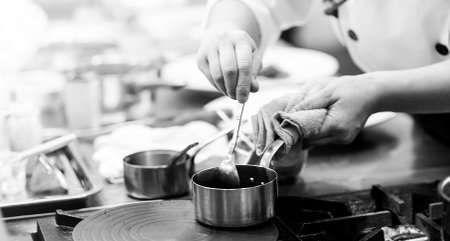 Chef cooking in a kitchen, chef at work, Black and White
