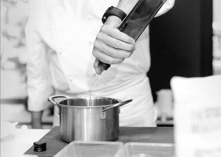 Chef cooking in a kitchen, chef at work, Black and Whiteの写真素材