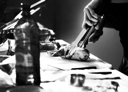 Chef cooking in a kitchen, chef at work, Black and Whiteの写真素材