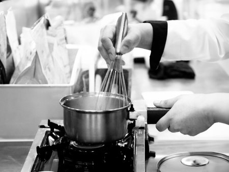 Chef cooking in a kitchen, chef at work, Black and Whiteの写真素材