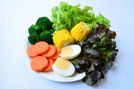Clean food,vegetables and egg on White backgroundの写真素材