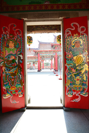 Gateway with red Chinese doorsの写真素材