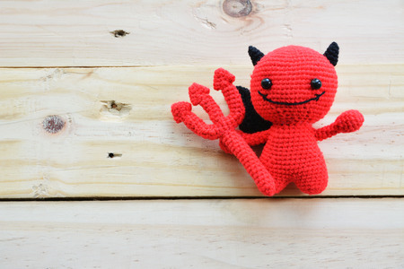 Dolls of yarn red devilの写真素材