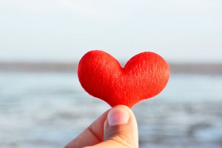 Red heart in handの写真素材
