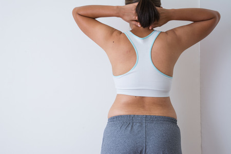 women fat with belly fat on white backgroundの写真素材