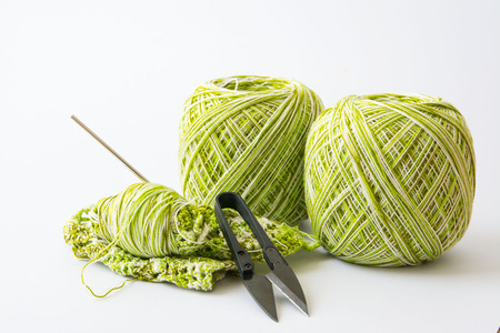 Yarn for knitting and Knitting tool on white  backgroundの写真素材