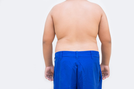Fat boy overweight on white backgroundの写真素材