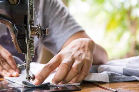 Closeup old sewing machine with handの写真素材