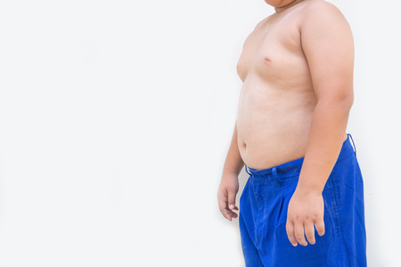 Fat boy overweight on white backgroundの写真素材