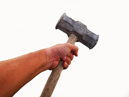 Big hammer in hand on white background