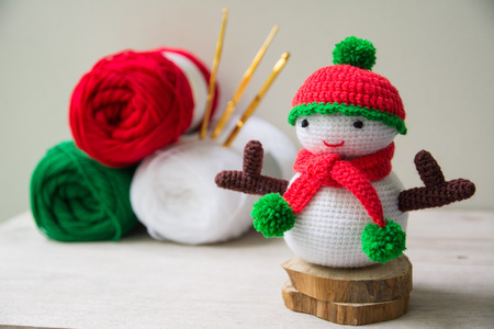 Handmade crochet  knitting snowman doll and Yarnの写真素材