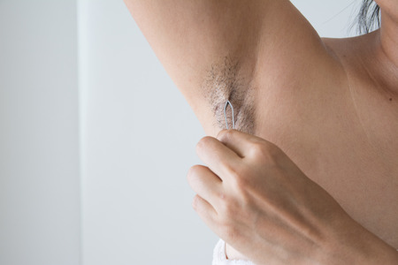 Armpit and armpit hair of Asian women on white backgroundの写真素材