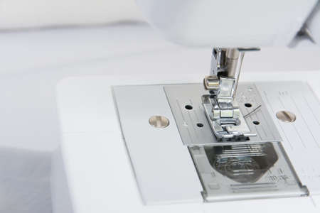 Close up shot white sewing machine