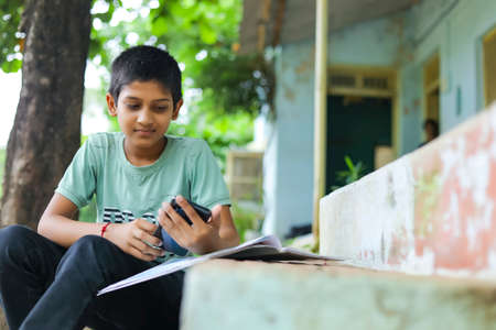 indian child attending online lecture