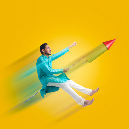 Diwali festival concept, young Indian man enjoying Diwali festivalの写真素材