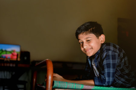Cute indian little child showing expression over lighting background