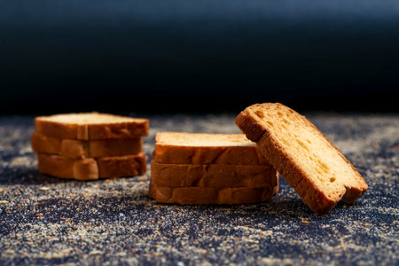 crispy rusk, cake rusk over white backgroundの写真素材