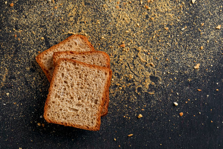Bakery product, crispy and dry khari or puff,rusk and bun with copy (tex) space over dark background