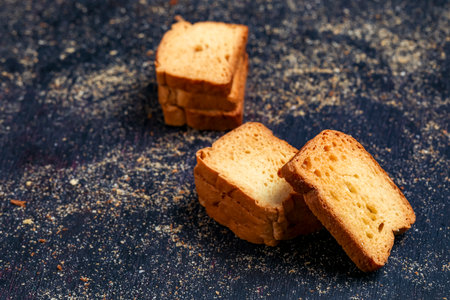 crispy rusk, cake rusk over Dark backgroundの写真素材