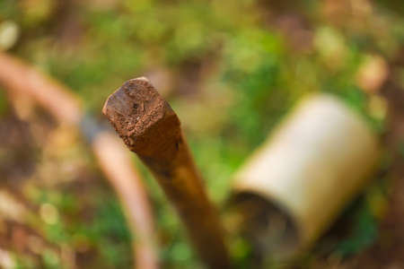 rusty wooden stick in farmの写真素材