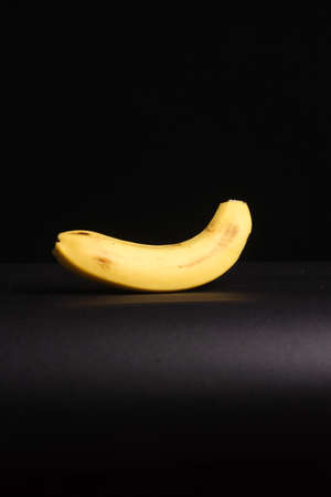 Banana fruit on dark backgroundの写真素材