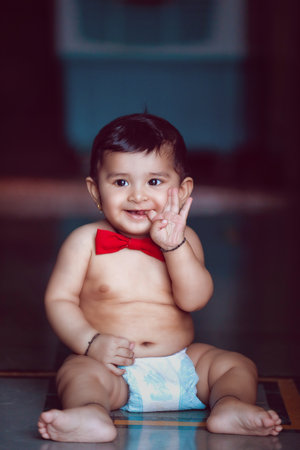 Cute indian baby child smiling