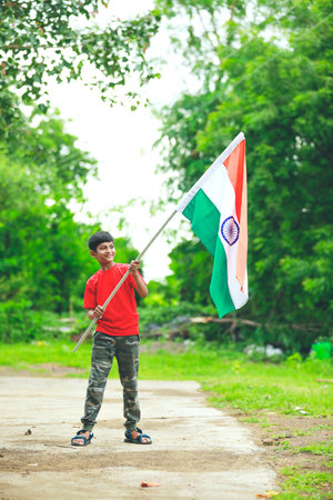 Cute little boy with Indian National Tricolor Flag