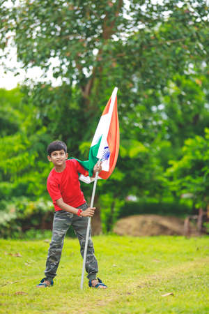 Cute little boy with Indian National Tricolor Flag