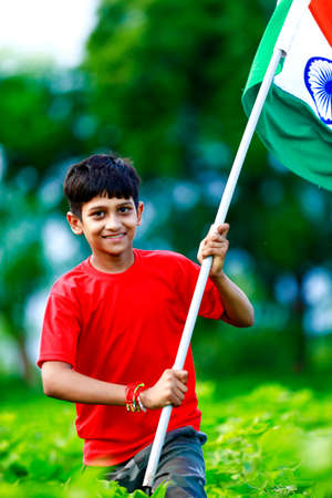 Cute little boy with Indian National Tricolor Flagの写真素材