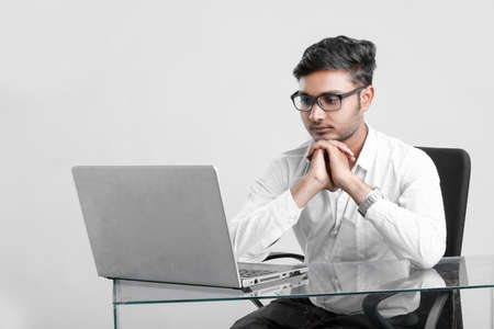 young indian man working at officeの写真素材