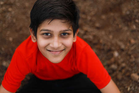 cute indian child at agriculture fieldの写真素材