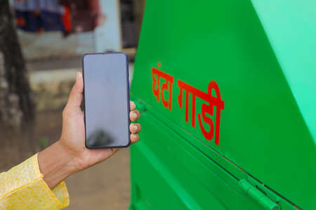 Man showing Smart phone with blank screenの写真素材