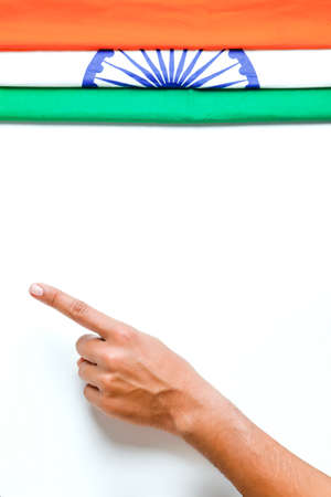 Concept of independent day or republic day of India : tricolor flag with handの写真素材