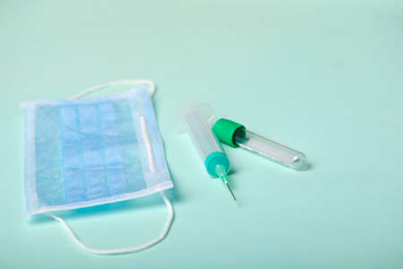 Medical mask, stethoscope and tablets for Corona protection concept.