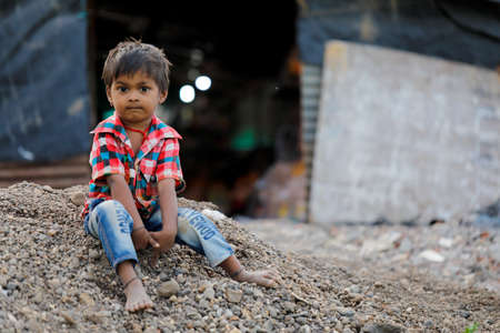Jalgaon, Maharashtra /India-August 12, 2019 : Poor Indian child smile and showing multi pal expressionのeditorial素材