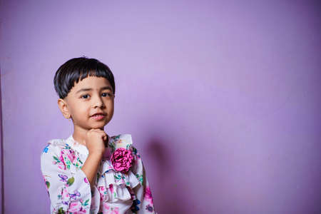 A cute stylish little indian girl giving expression.の写真素材