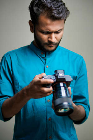 Photographer With Camera on white background.の写真素材