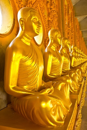 Golden monk statue in Maha Jadee Chaimonkol, Roi Et provinceの写真素材