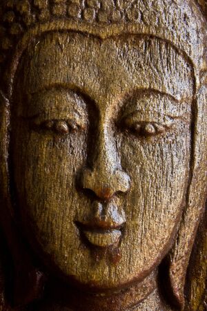 Wood craft Lord Buddha faceの写真素材