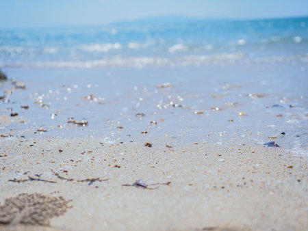 Closed up Sand on the beach and  blue sky backgroundの写真素材
