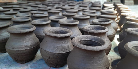 clay pots in the pottery workshop, closeup of photoの写真素材