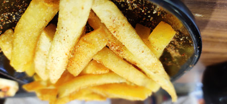 French fries in a plastic container. Selective focus. Food.の写真素材