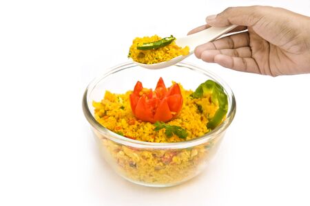 Decorating delicious food of rice and salad in beautiful bowl  の写真素材
