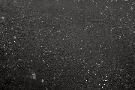 Black rough fibrous having dirty spots in light の写真素材