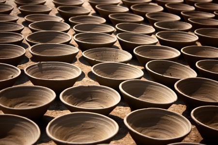 Collection of clay pot in a row waiting for dry , used in perfume of soil and lightening in...