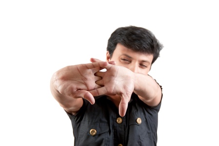 Indian Young man in black dress  stretching their handの写真素材