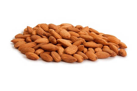 Pile of almonds isolated over white backgroundの写真素材