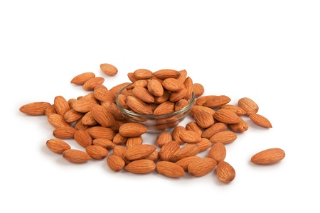 Pile of almonds isolated over white backgroundの写真素材