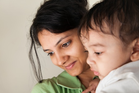 Indian Happy mother and baby playing with each otherの写真素材