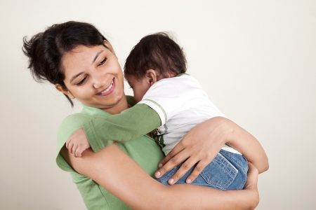Indian Happy mother and baby playing  each otherの写真素材